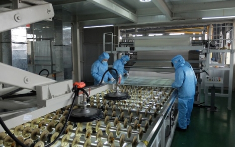 Adhesive laminating room